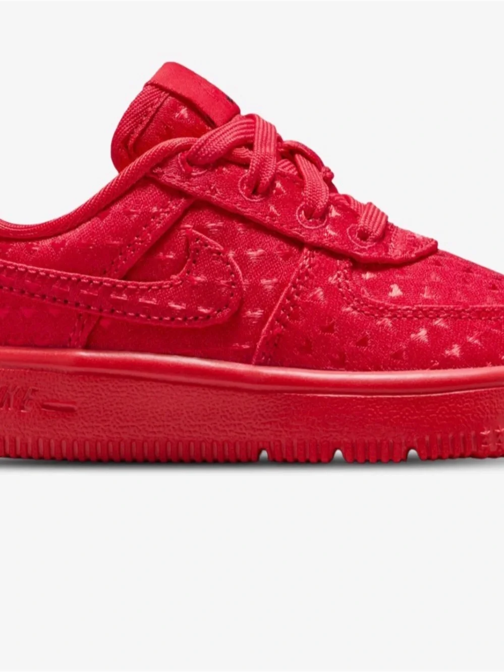 Nike Kids Red Low-Top Sneakers with Subtle Pattern